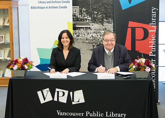Guy Berthiaume, Library and Archives Canada; and Sandra Singh, Vancouver Public Library. Photo credit: Library and Archives Canada.