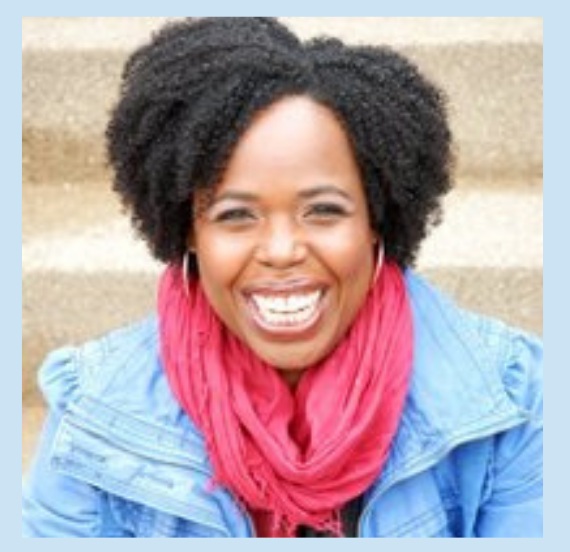 A headshot of presenter Kellee E. Warren who is a Black middle-aged woman with tightly curled mid-length hair. She is smiling, wearing a pink scarf and blue jacket, seated on a set of stairs.